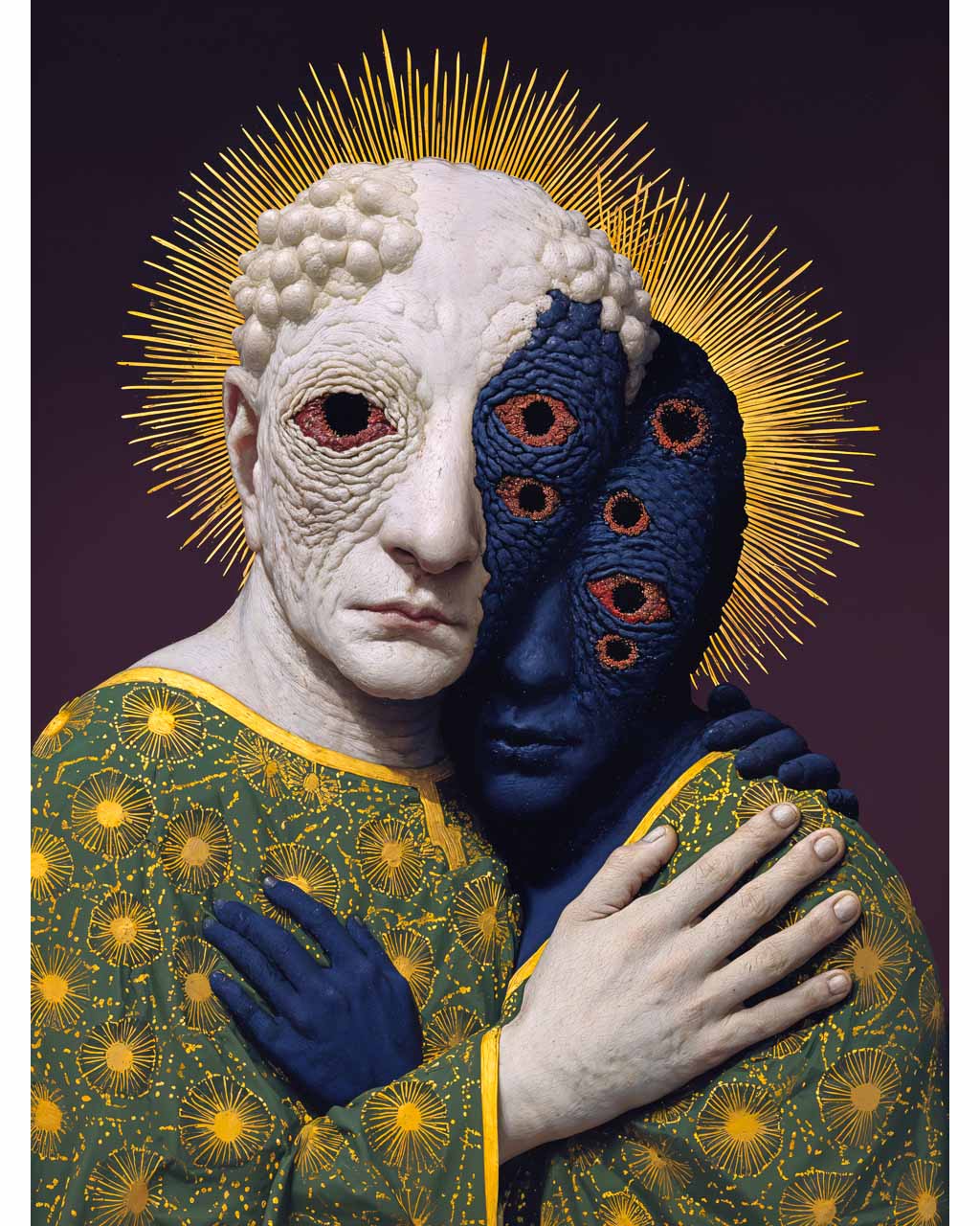 Surreal artwork of two bizarre figures embracing.