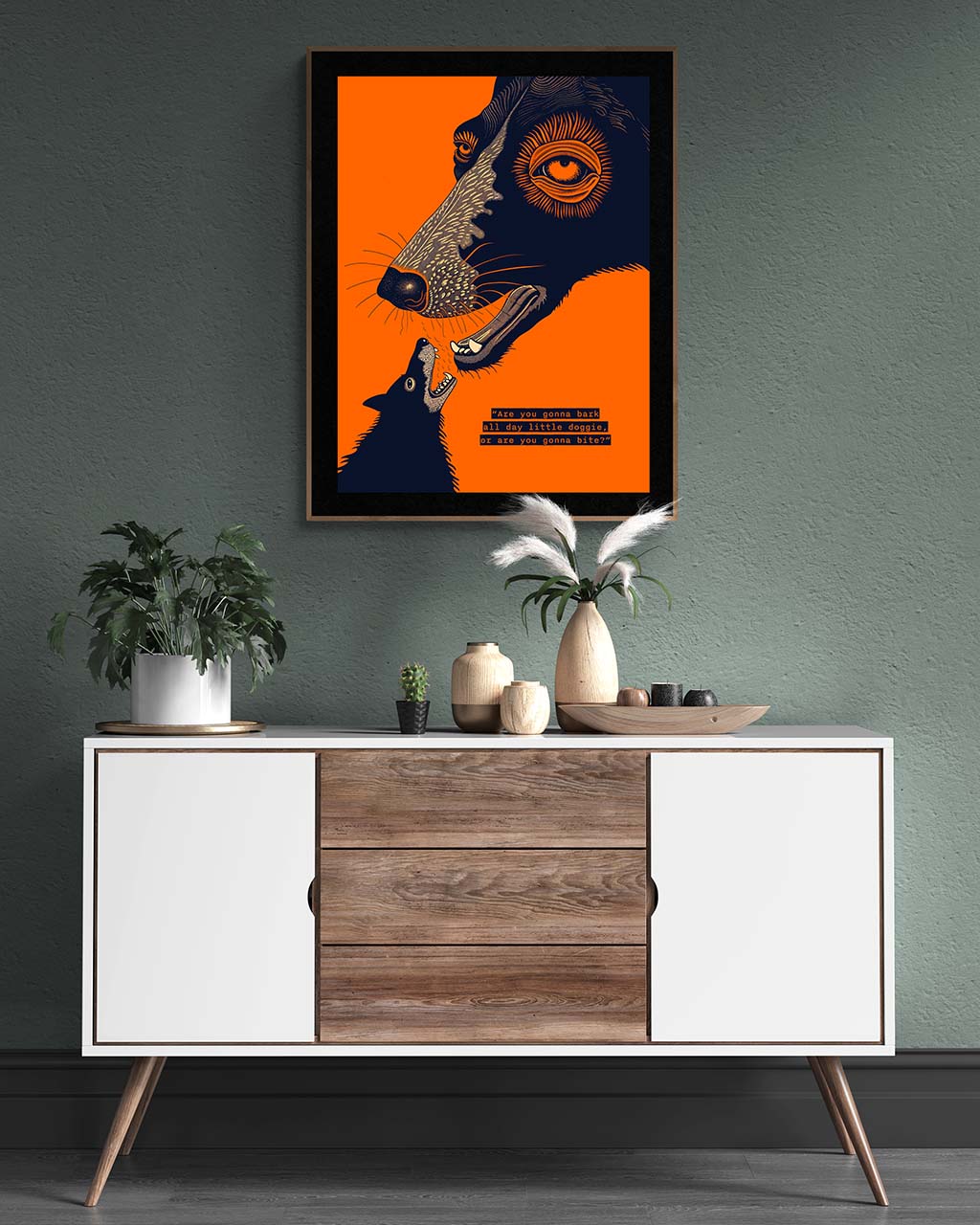 Poster hanging on the wall in a modern setting. Poster features two dogs in a dramatic face-off against vibrant orange background.