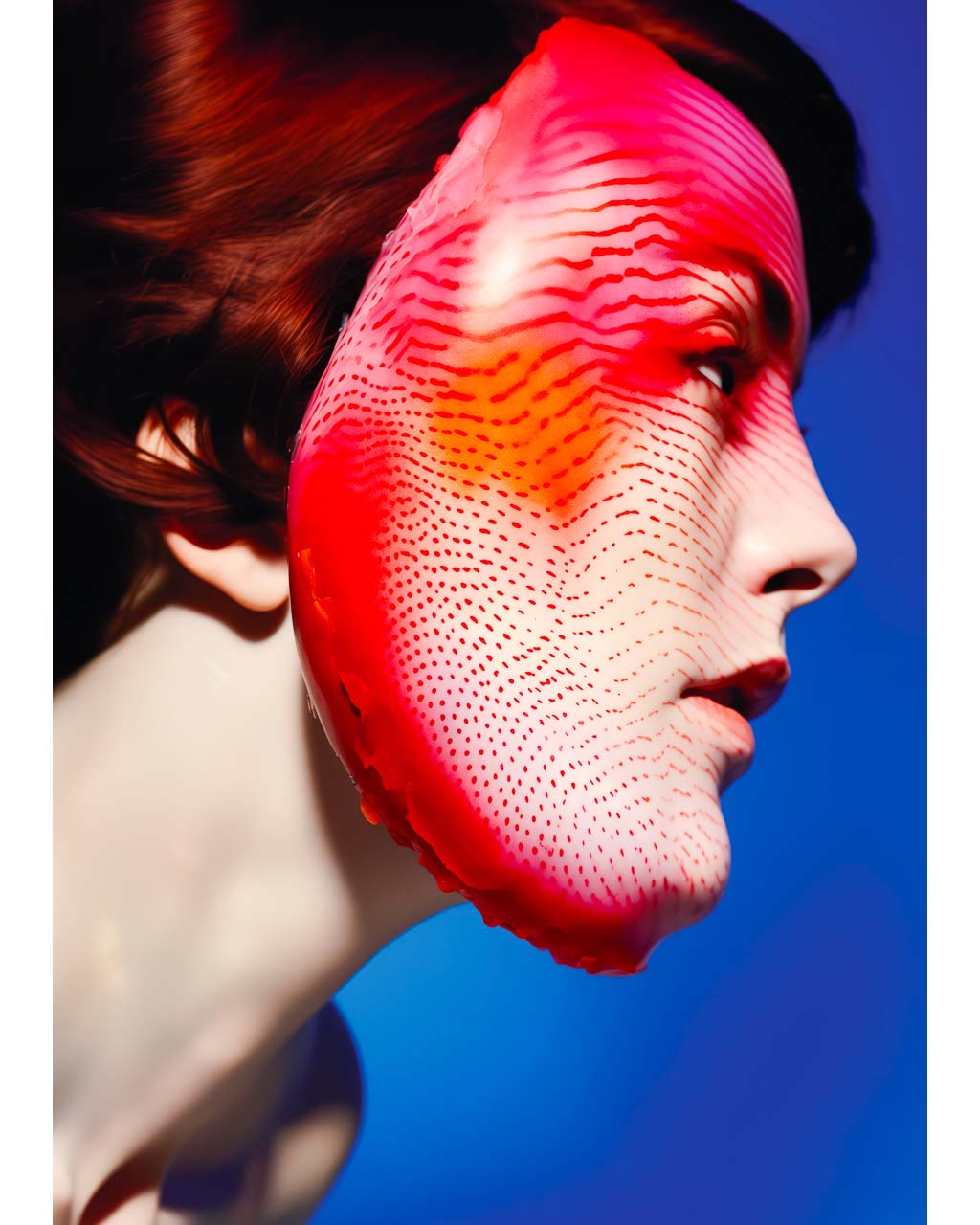 Poster art. Woman wearing a mask and red face paint.