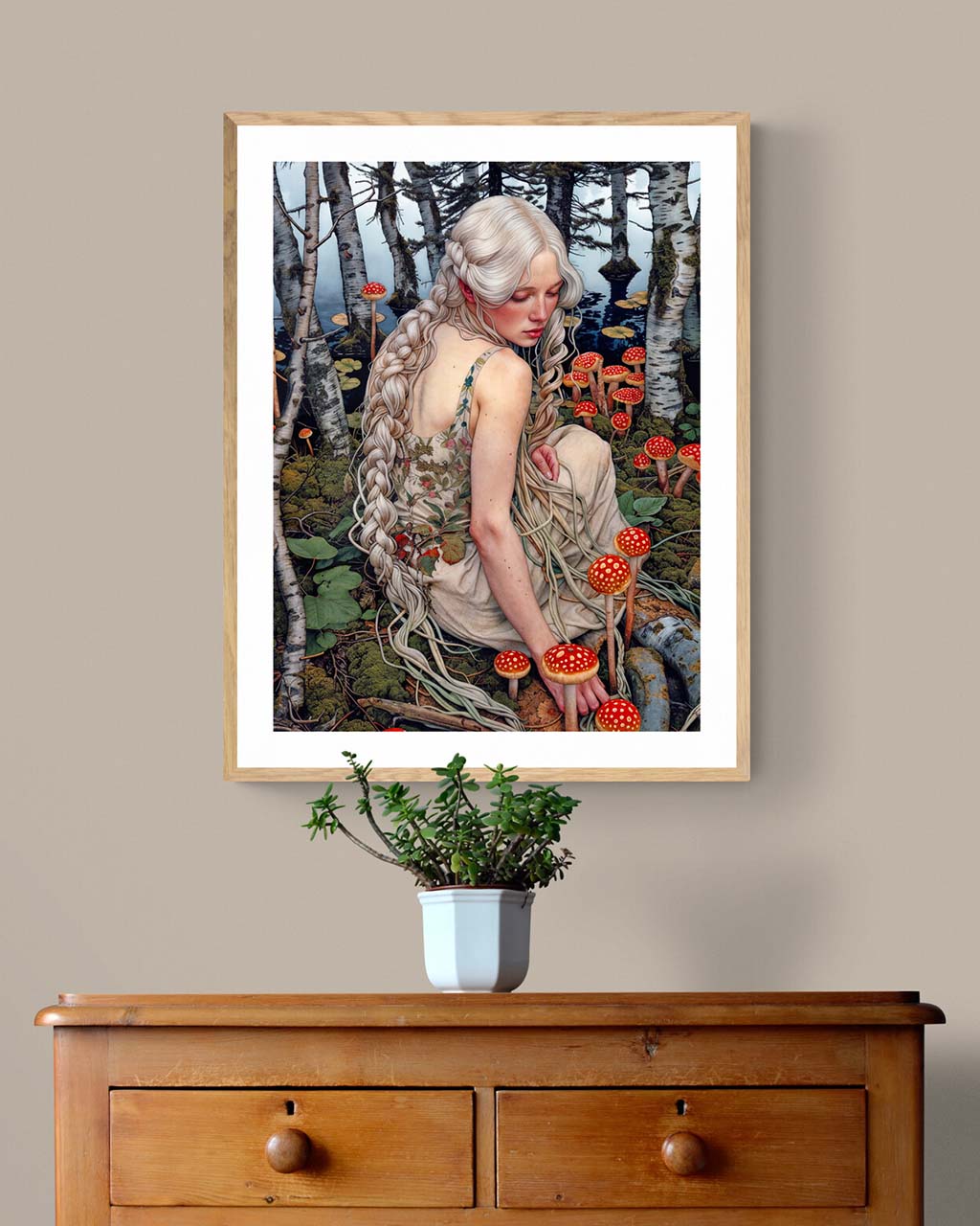 Art poster hanging on the wall. The poster features a young woman sitting by the lake, looking at poisonous mushrooms.