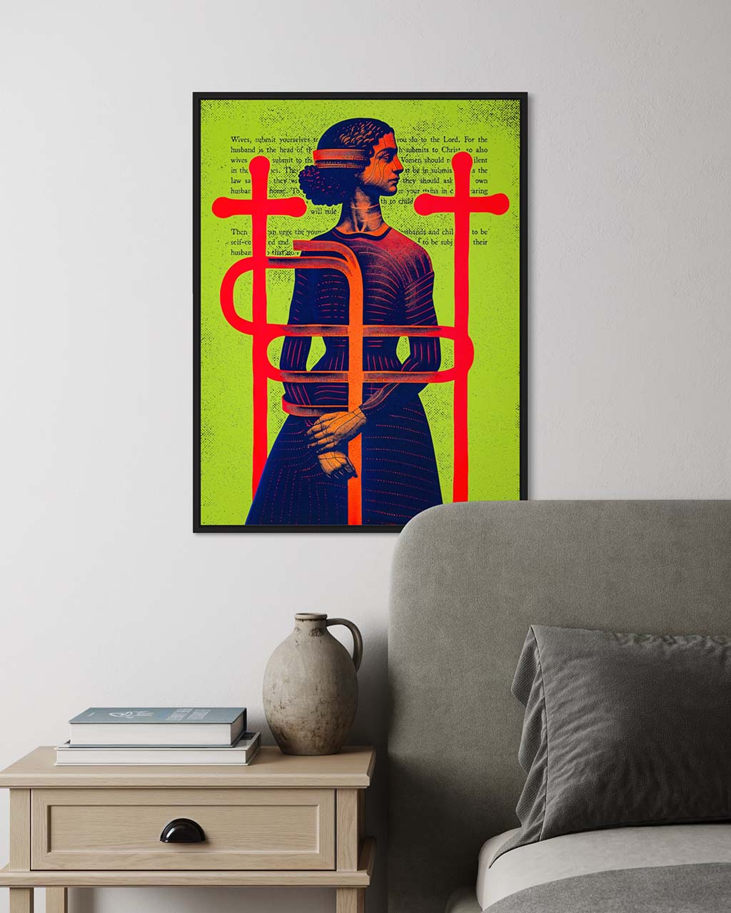 Art poster on wall in a modern bedroom. Poster depicts a woman bound within a cage of red crosses, overlaid with Bible verses.